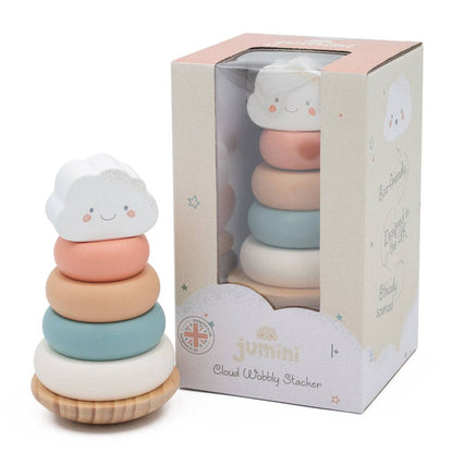Wooden stacking toy with cloud design next to its packaging on a white background