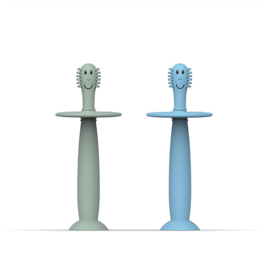 Two children's toothbrushes with smiling heads on a white background