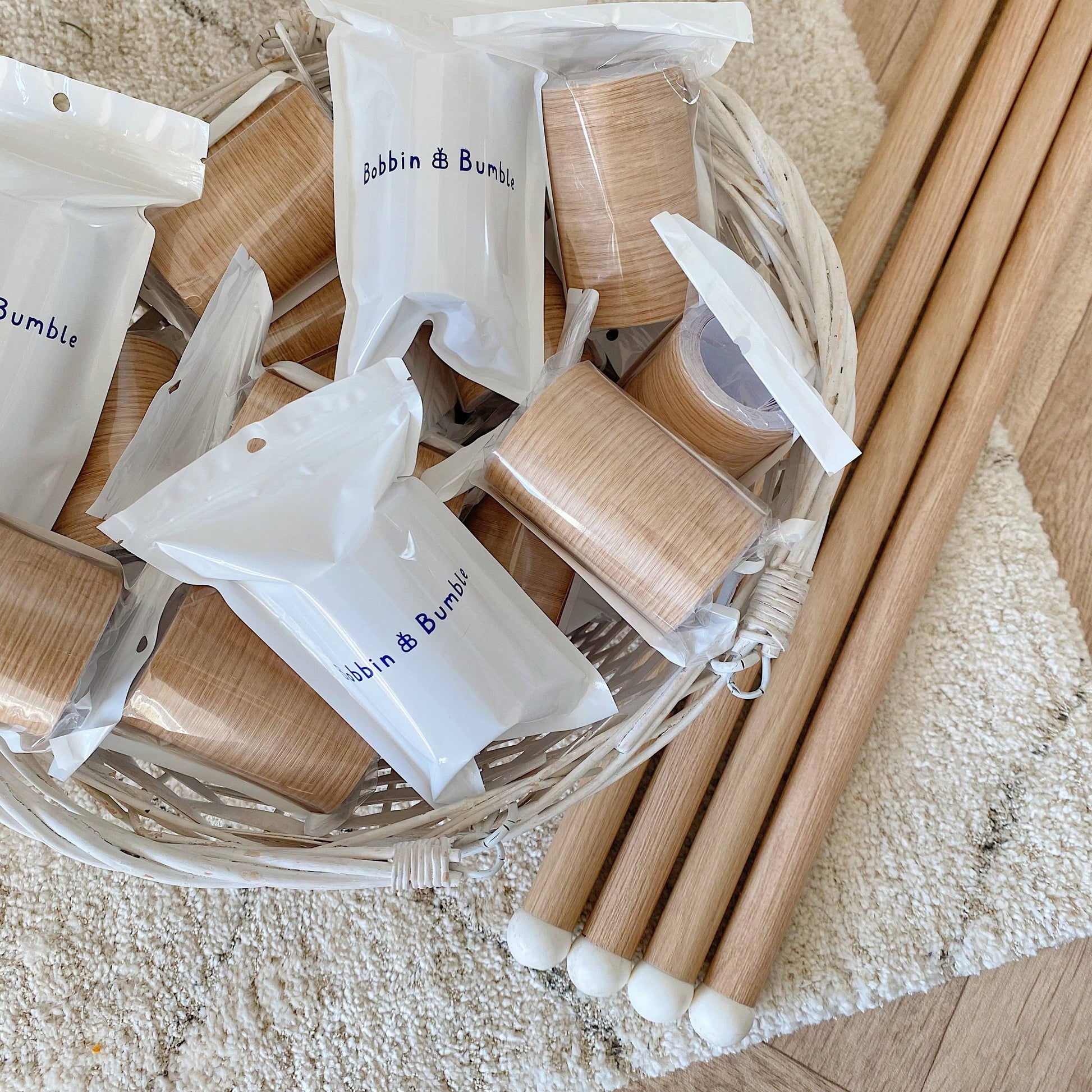 Bobbin & Bumble highchair leg wraps with packaging on a textured surface