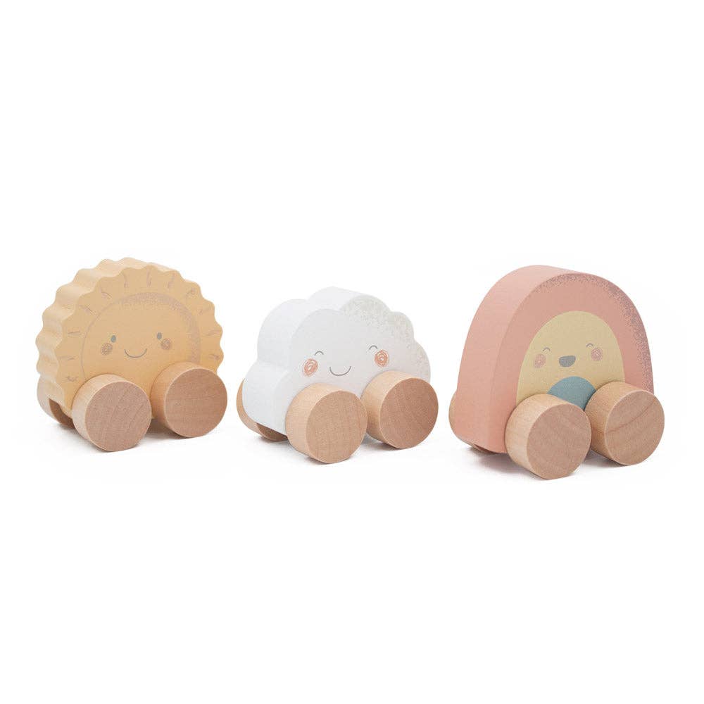 Three wooden toys shaped like a cloud, a sun, and a rainbow on a white background