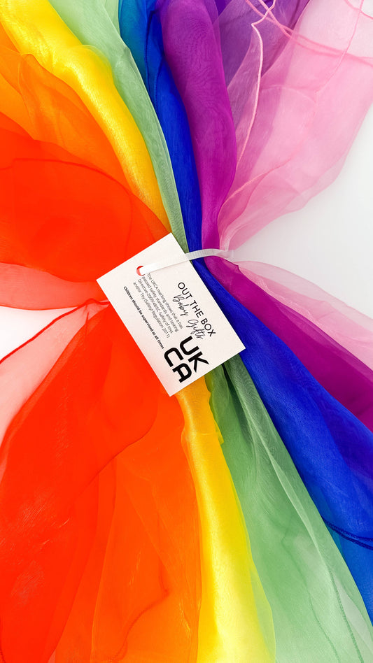 Colorful fabric with a visible brand tag on a white background