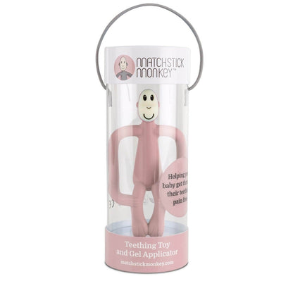 Pink teething toy and gel applicator in a transparent packaging with Matchstick Monkey branding.