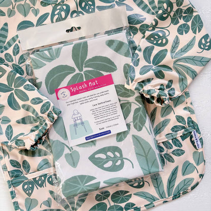 Splash hat with leaf pattern and packaging on a white background