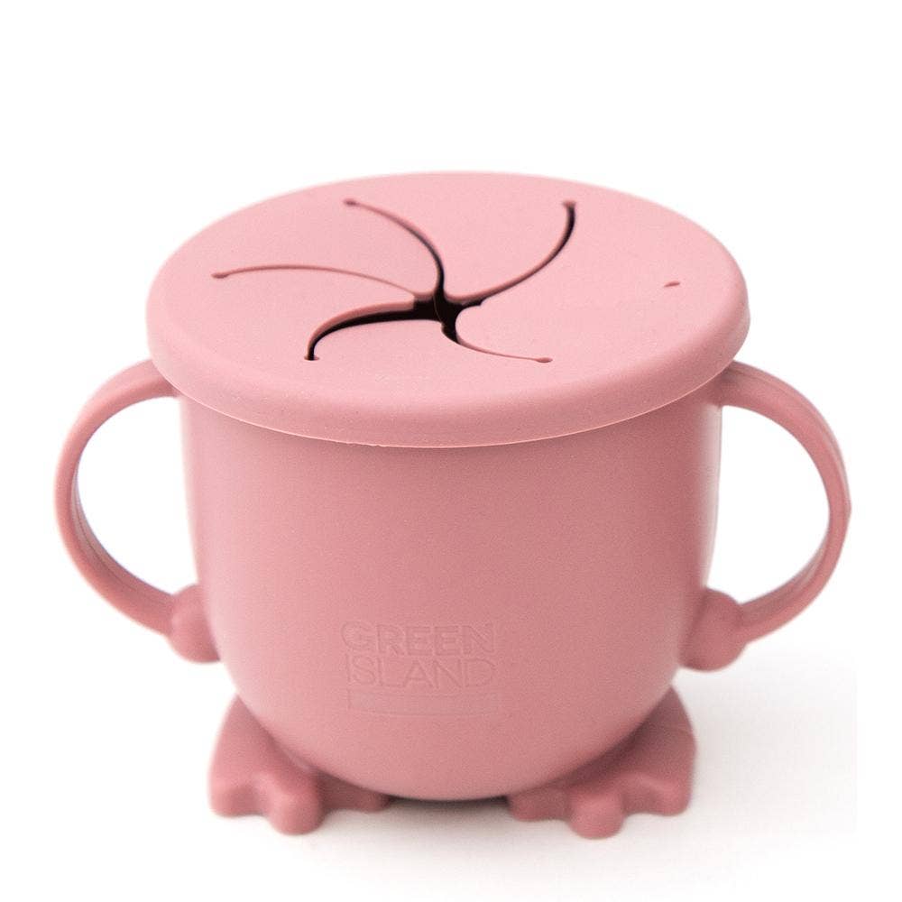 Pink children's cup with handle and lid on a white background