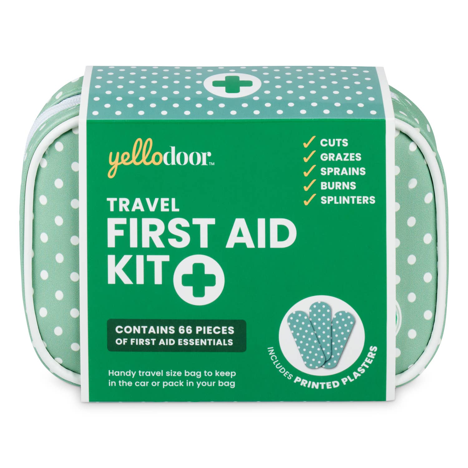 Green travel first aid kit with polka dot design on a white background
