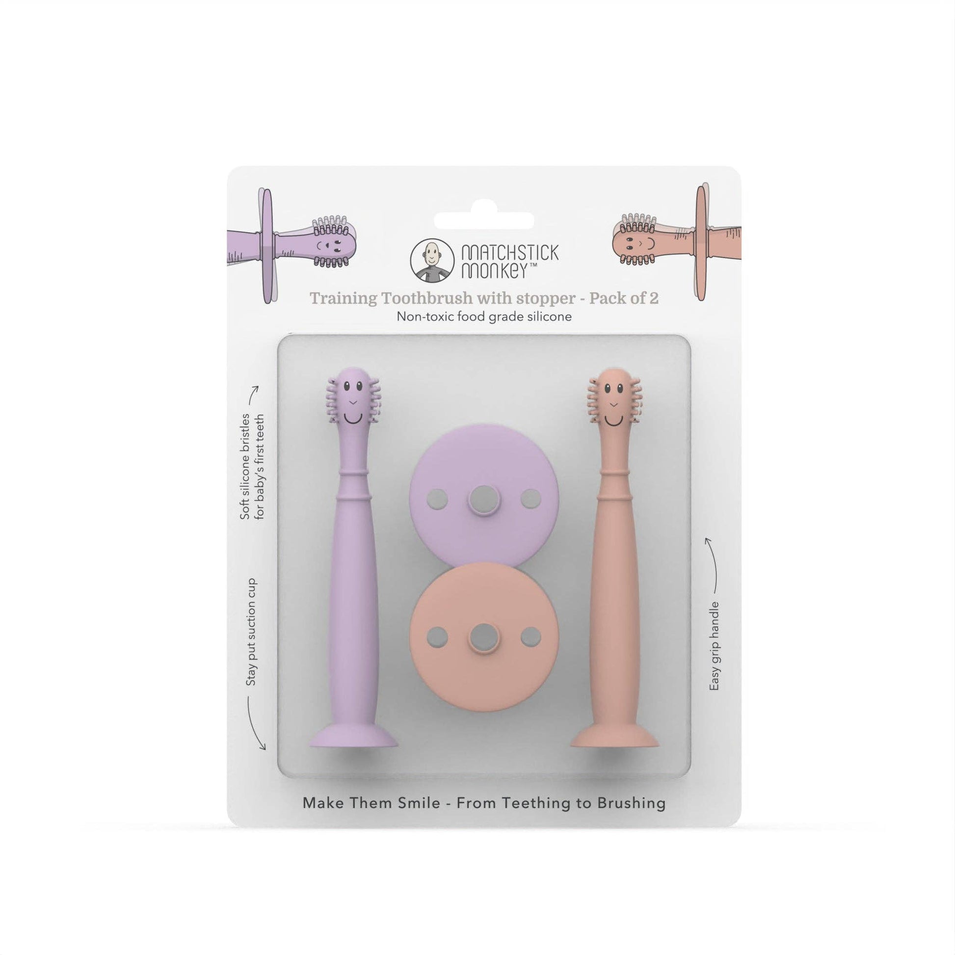 Packaging of Matchstick Monkey training toothbrushes with stoppers in purple and pink on a white background.