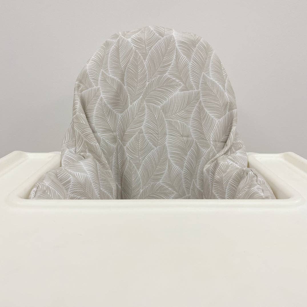 Chair with a patterned backrest on a plain background