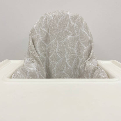 Chair with a patterned backrest on a plain background