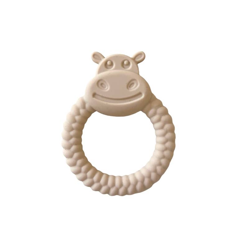 Beige hippo-shaped teething ring on a white background