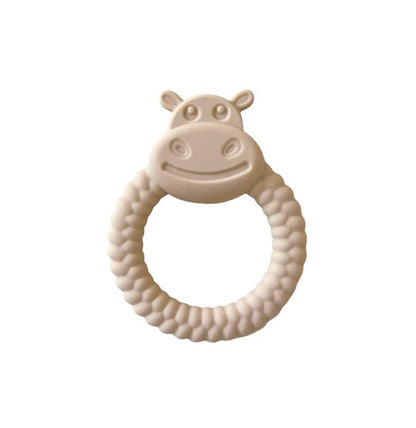 Beige hippo-shaped teething ring on a white background