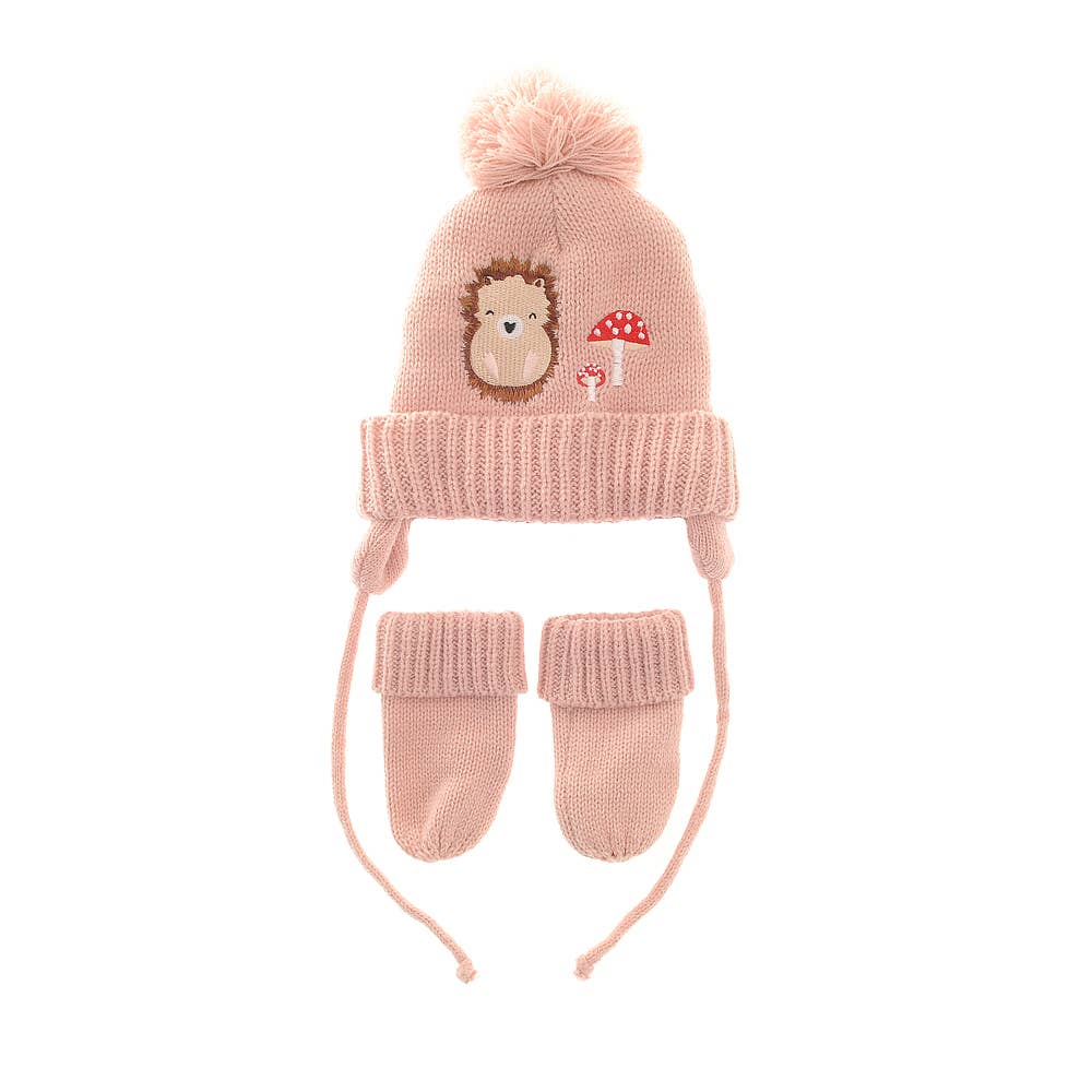 Pink knit hat and mittens set with hedgehog design on a white background