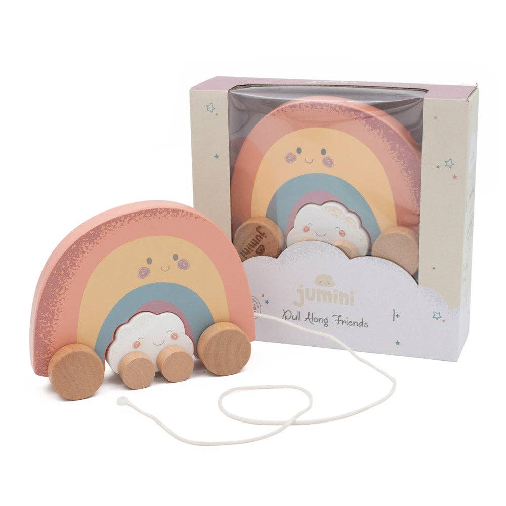Wooden rainbow toy with cloud and wheels, displayed in a Jumini box on a white background