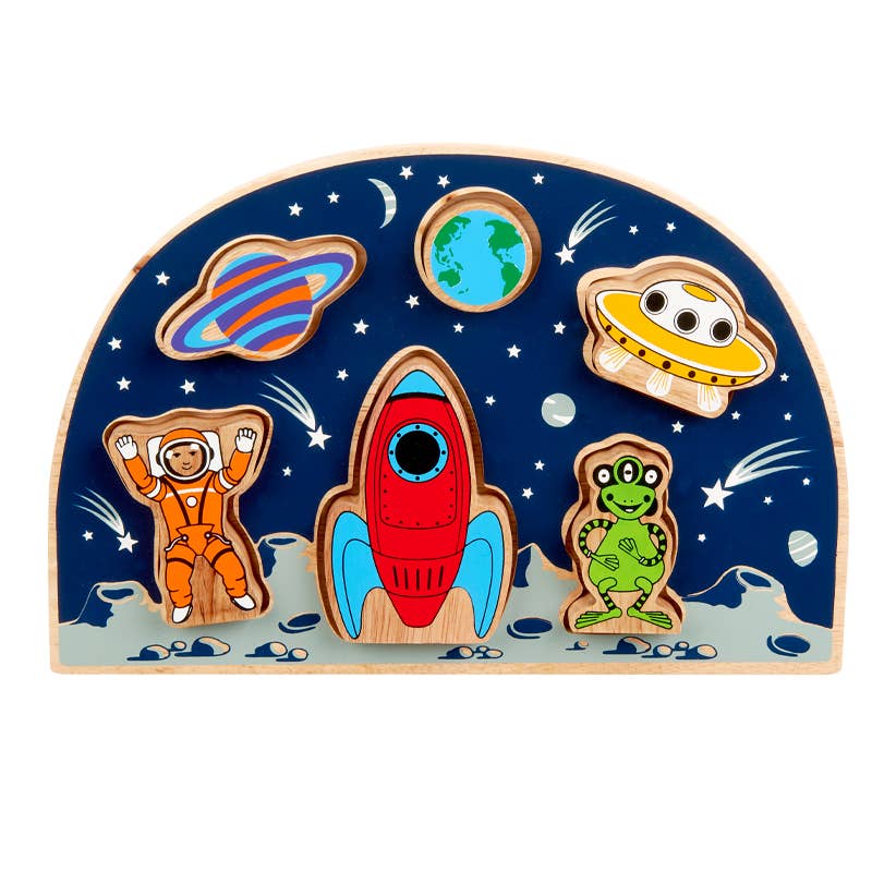Wooden space-themed puzzle with astronaut, rocket, alien, and UFO pieces on a blue background.