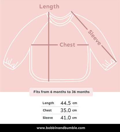 Measurement chart for a child's bib on a pink background with dimensions and brand name.