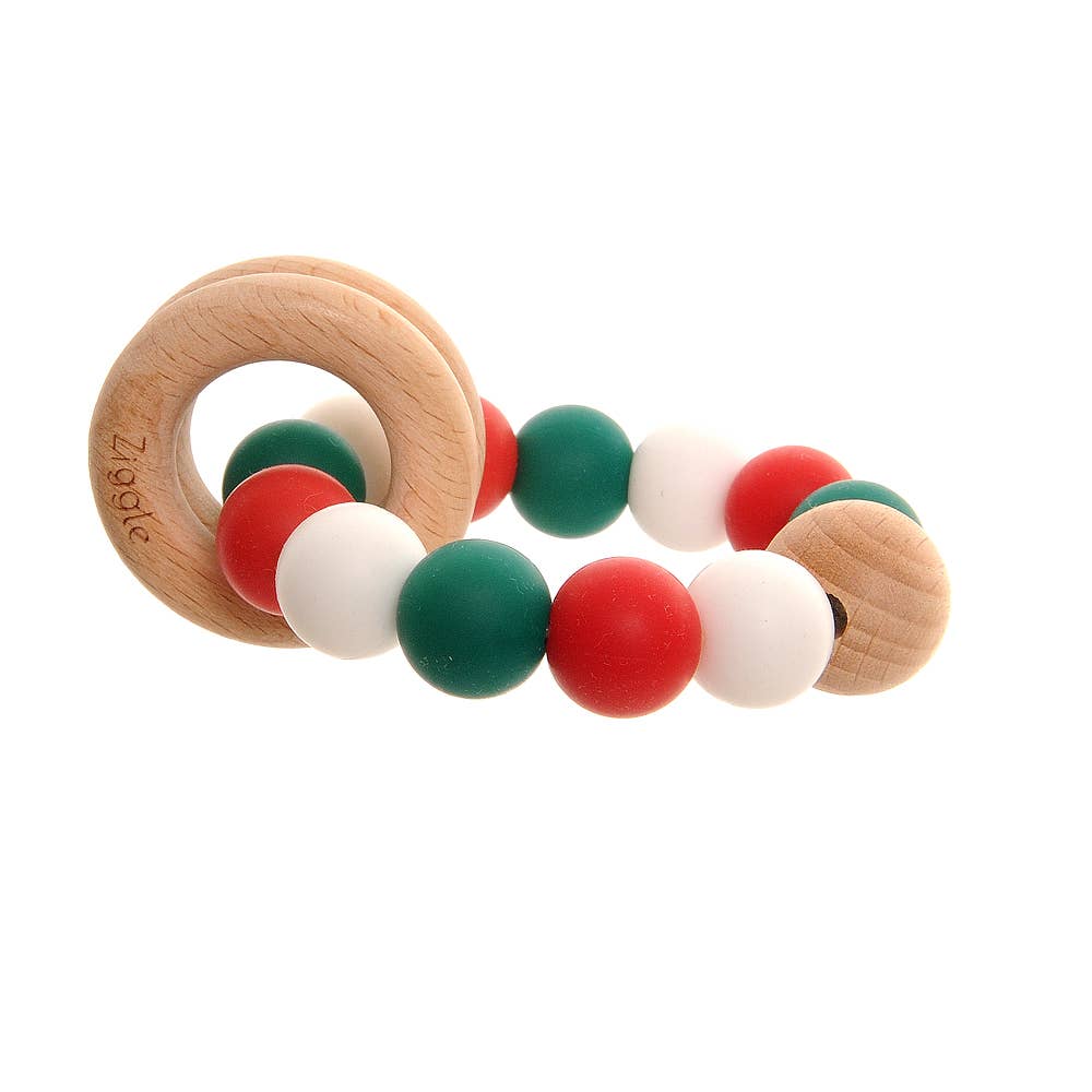 Wooden teething ring with colorful beads on a white background