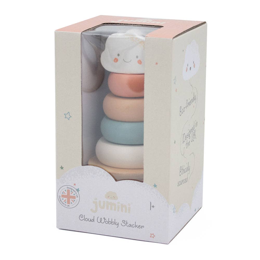 Stack of colourful baby toys in a Jumini packaging box on a white background