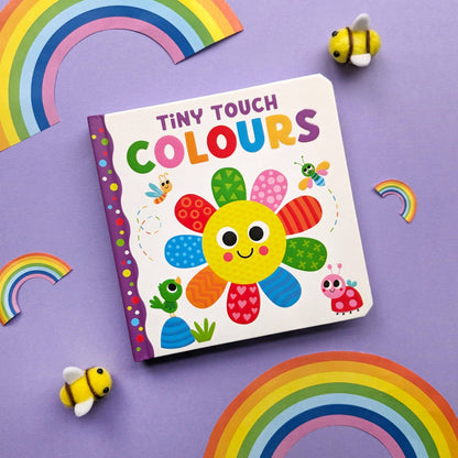 Children's book titled 'Tiny Touch Colours' with colorful illustrations on a purple background with rainbows and bees.
